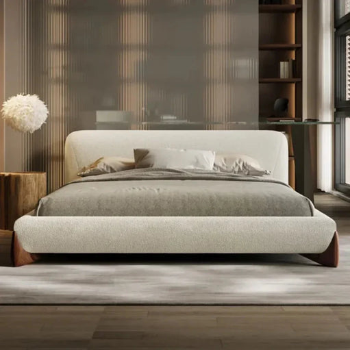 Oak Inside Modern bedroom with a beige upholstered bed, wooden side tables, and a glass desk.